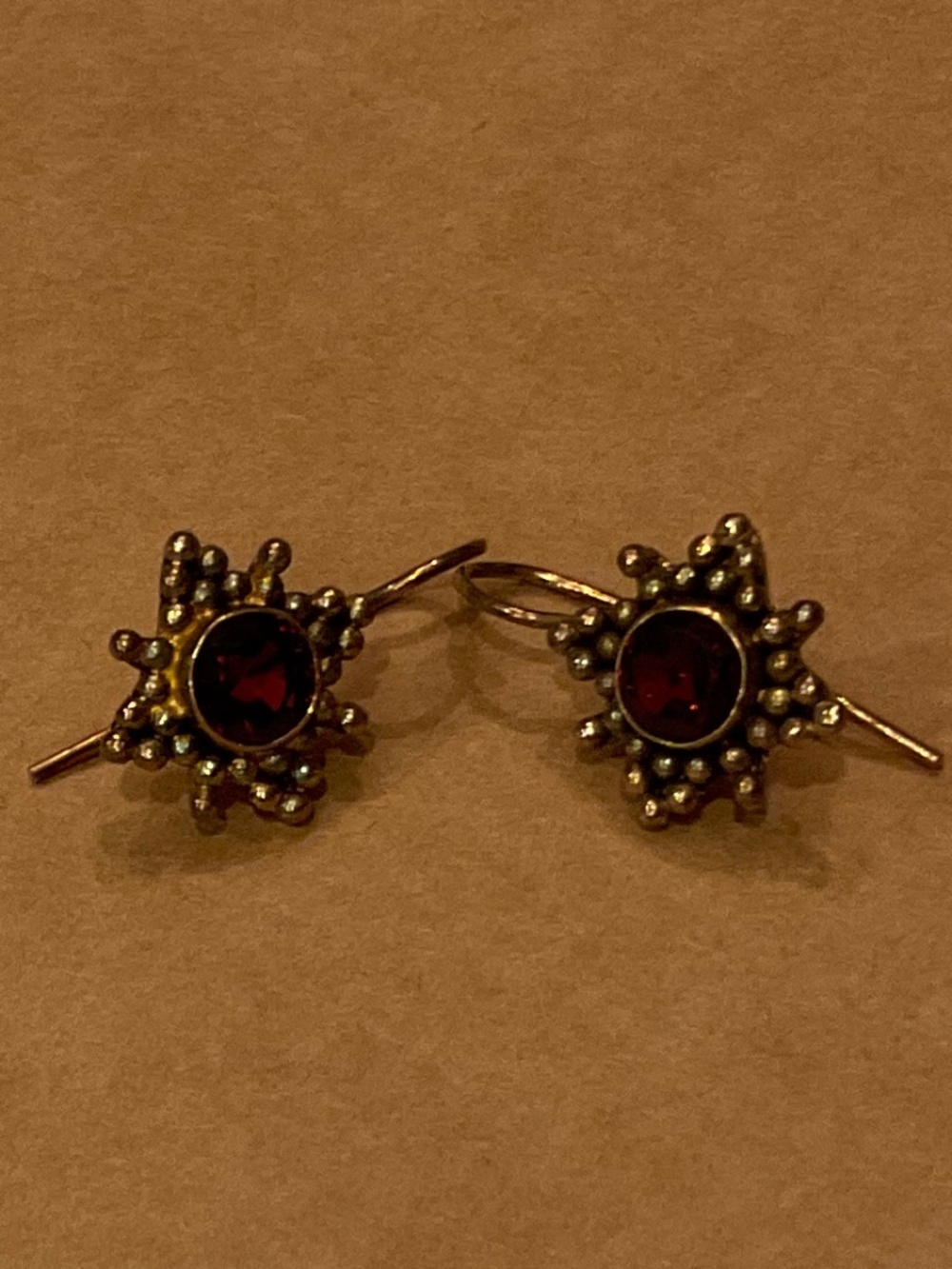 Vintage earrings with ruby colored stones